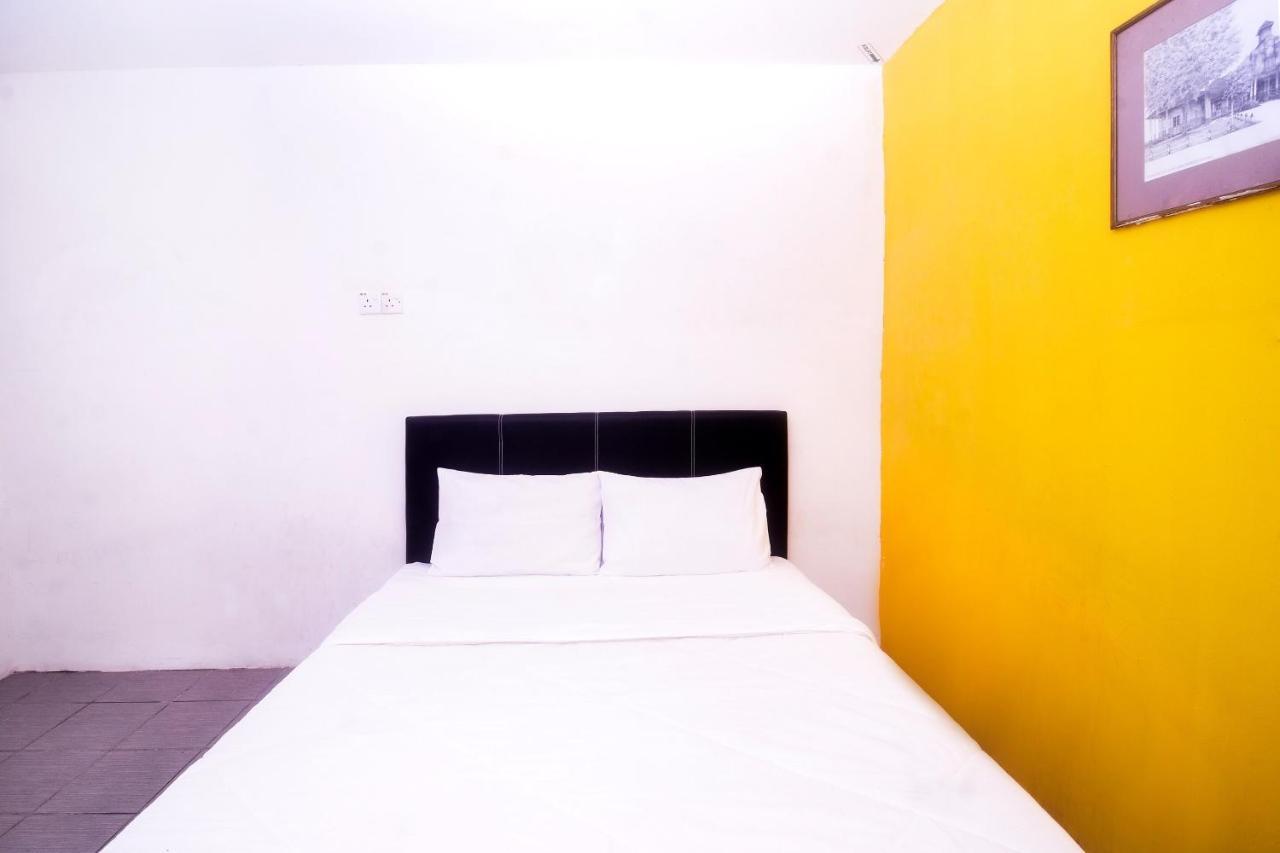 Spot On 89886 Backpacker'S Stay Services Kuching Exterior photo
