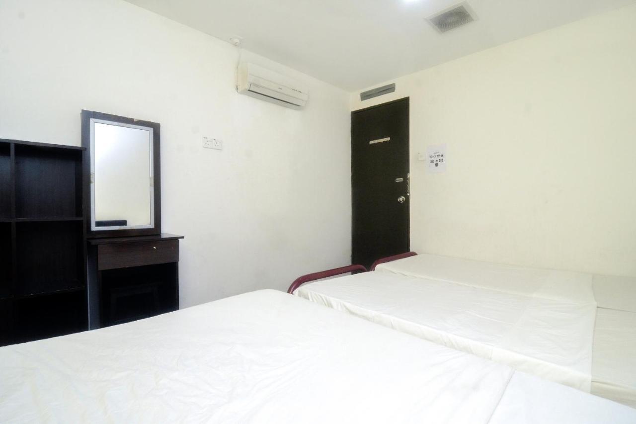 Spot On 89886 Backpacker'S Stay Services Kuching Exterior photo