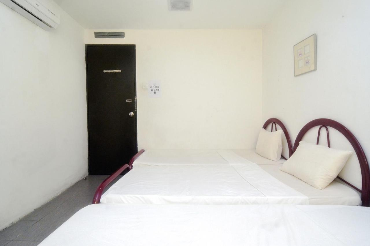 Spot On 89886 Backpacker'S Stay Services Kuching Exterior photo
