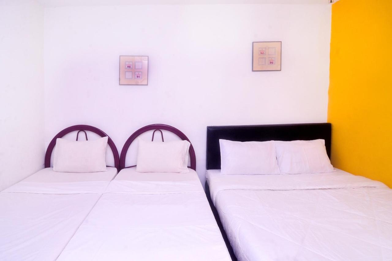 Spot On 89886 Backpacker'S Stay Services Kuching Exterior photo