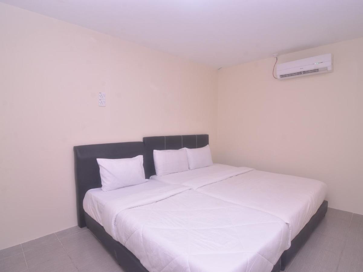 Spot On 89886 Backpacker'S Stay Services Kuching Exterior photo
